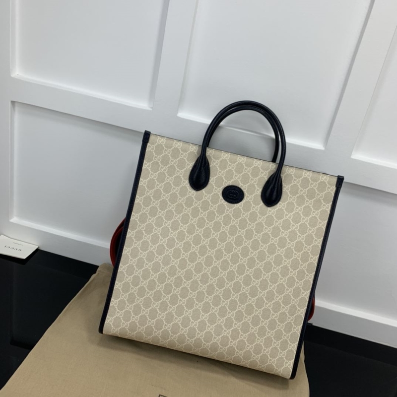 G*u*i shopping bags